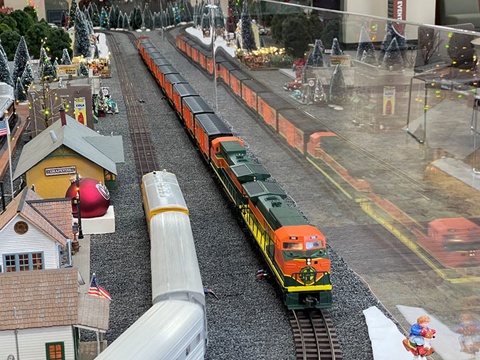 WC Trains display with BNSF train pulling 10 box cars