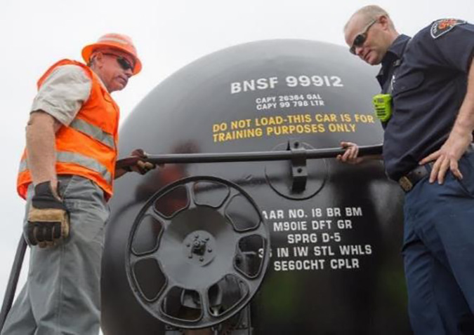 Brady explains tank car components.